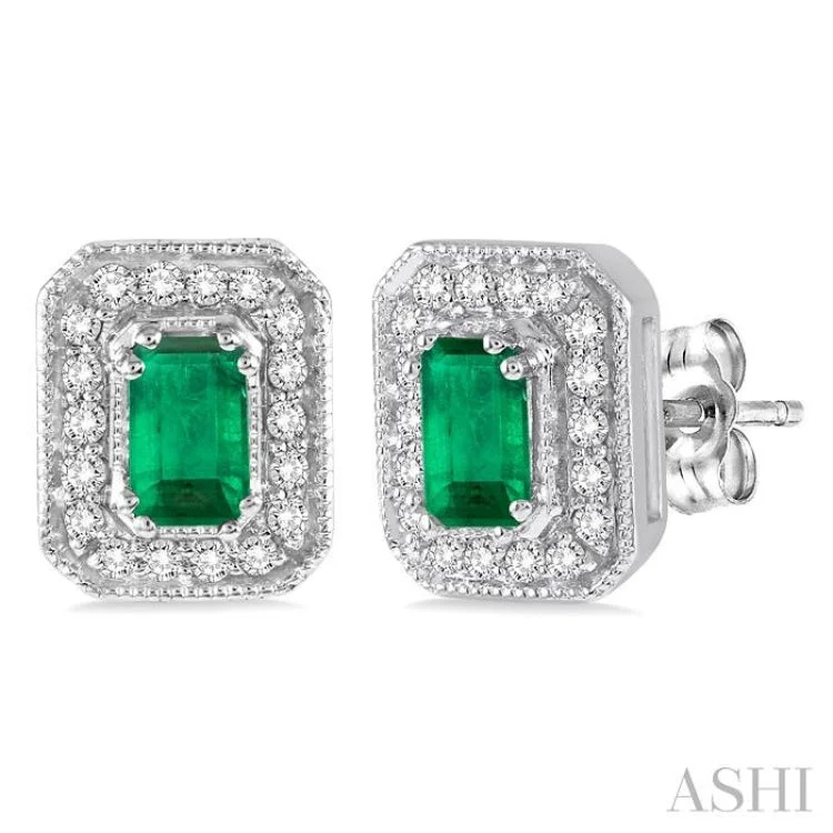 Ladies flower-shaped earrings-5x3 mm Octagon Cut Emerald and 1/4 Ctw Round Cut Diamond Earrings in 14K White Gold