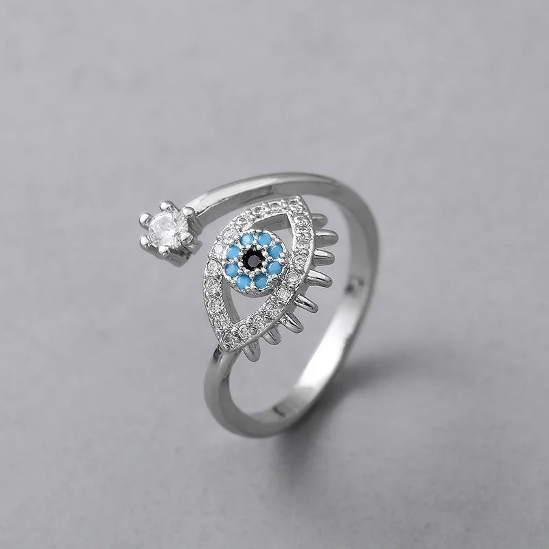 One White Gold Color Eye Ring