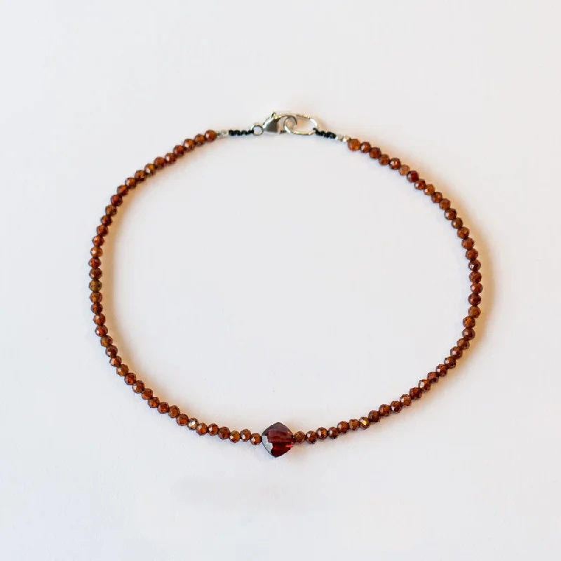 Ladies minimalist gold bracelet-Margaret Solow | Hessonite Garnet Bracelet with Center Garnet Bead