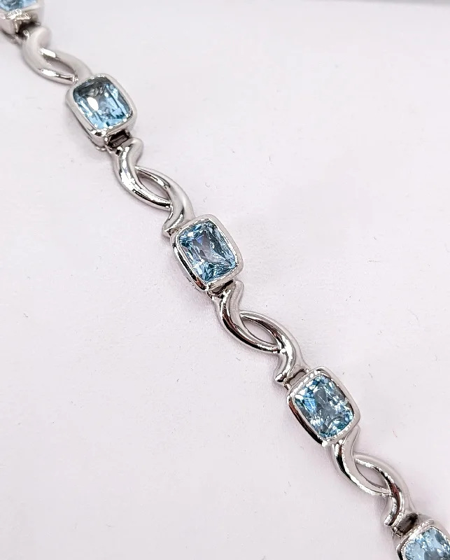 Ladies customized bracelet-silver natural blue topaz round claw clasp 9in bracelet