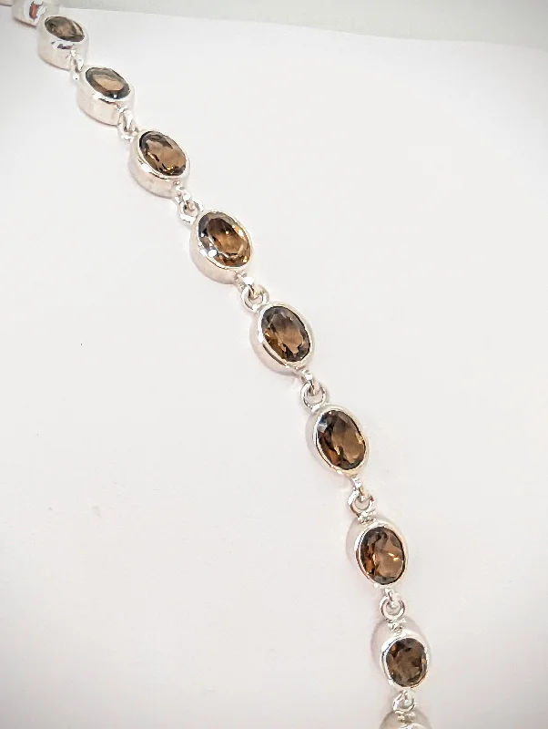 Ladies statement bracelet-Silver Oval Cut Bezel Set Natural Smokey Quartz 9in Bracelet